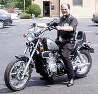 Father Ken on His Bike